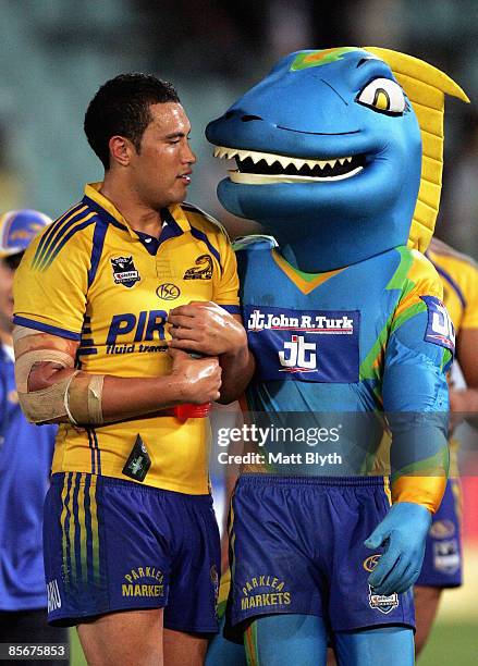 Feleti Mateo of the Eels is congratulated by the Eels mascot 'Sparky' after the round three NRL match between the Parramatta Eels and the Canberra...