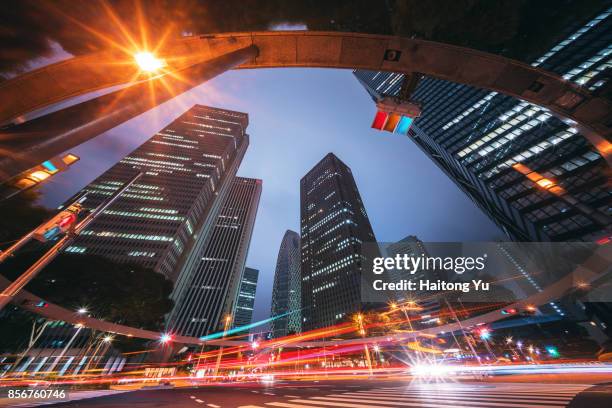 shinjuku, tokyo. cross road with circular traffic lights. - shinjuku stock pictures, royalty-free photos & images