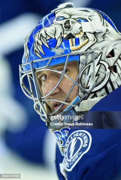 Goaltender Evgeni Nabokov of the Tampa Bay Lightning plays in a game against the Vancouver Canucks at Amalie Arena on January 20, 2015 in Tampa,...