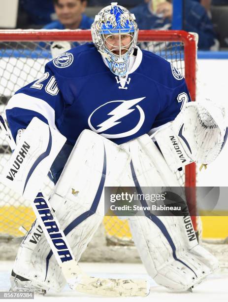 Goaltender Evgeni Nabokov of the Tampa Bay Lightning plays in a game against the Vancouver Canucks at Amalie Arena on January 20, 2015 in Tampa,...