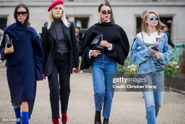 Group of guests seen outside Sacai during Paris Fashion Week Spring/Summer 2018 on October 2, 2017 in Paris, France.