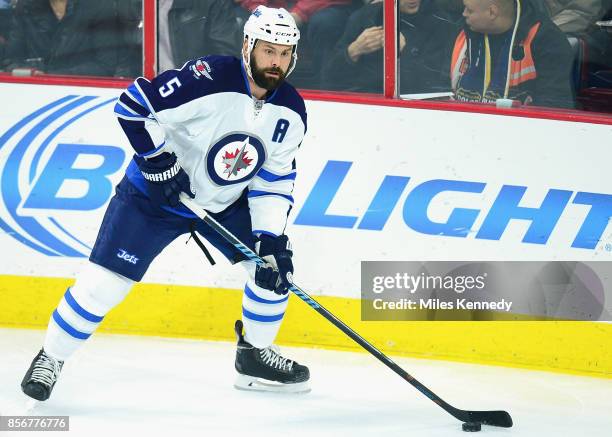 Mark Stuart of the Winnipeg Jets plays in a game against the Philadelphia Flyers at Wells Fargo Center on January 29, 2015 in Philadelphia,...