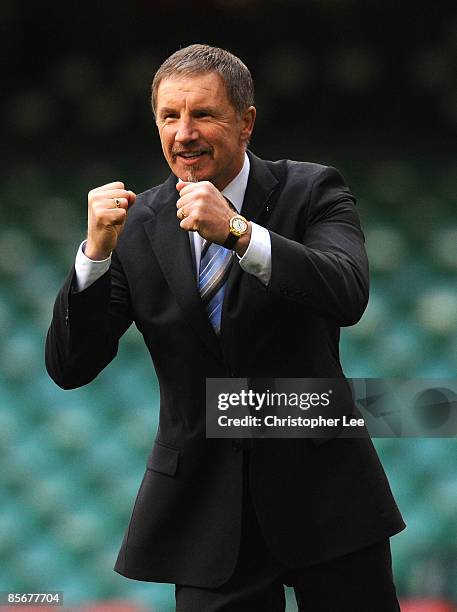 Coach Stuart Baxter of Finland celebrates their 2:0 victory at the close of the FIFA 2010 World Cup Qualifier Group 4 match between Wales and Finland...