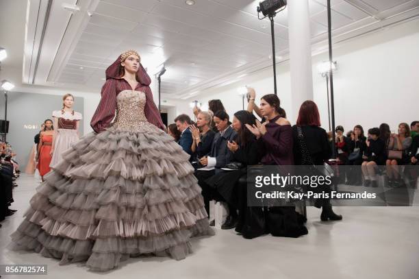 Models walk the runway during the Nobi Talai Paris show as part of the Paris Fashion Week Womenswear Spring/Summer 2018 on October 2, 2017 in Paris,...