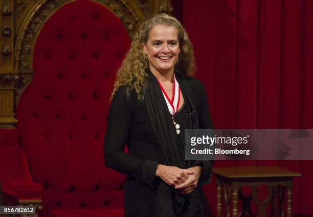 Julie Payette, governor general of Canada, smiles after being sworn in during an installation ceremony in the Senate Chamber of Parliament Hill in...
