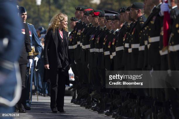 Julie Payette, governor general of Canada, inspects the Honour Guard for the first time on Parliament Hill in Ottawa, Ontario, Canada, on Monday,...