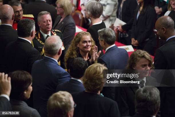 Julie Payette, governor general of Canada, center, greets attendees after being sworn in during an installation ceremony in the Senate Chamber of...