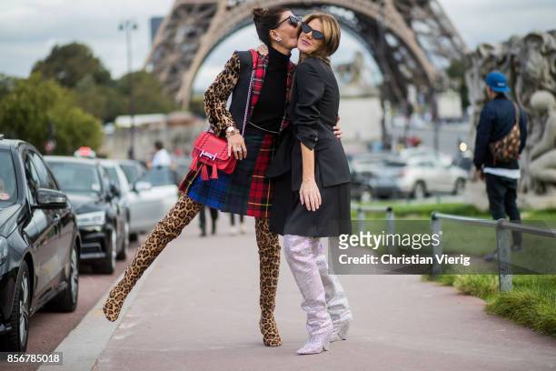 Giovanna Battaglia Engelbert and Anna dello Russo wearing YSL glitter boots seen outside Hermes during Paris Fashion Week Spring/Summer 2018 on...