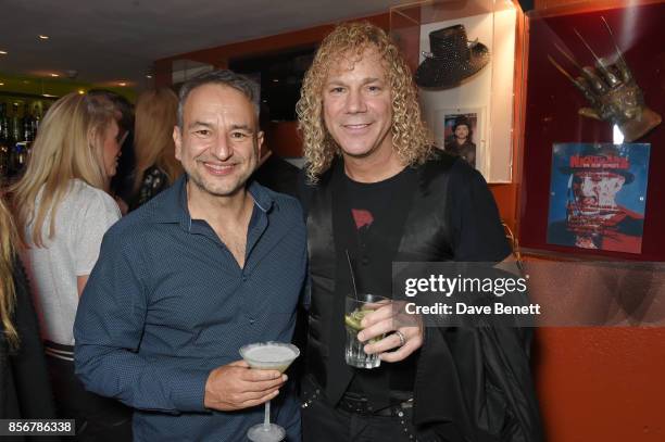 Playwright Joe DiPietro and composer David Bryan attend the press night after party for "The Toxic Avenger: The Musical" at The Planet Hollywood on...