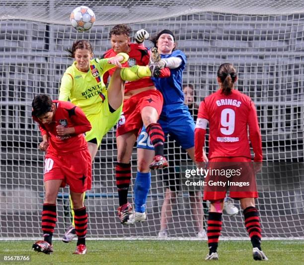 Goalkeeper Kathrin Laengert goes up for a header during the UEFA Women's Cup semi final first leg match between Olympique Lyonnais and FCR 2001...