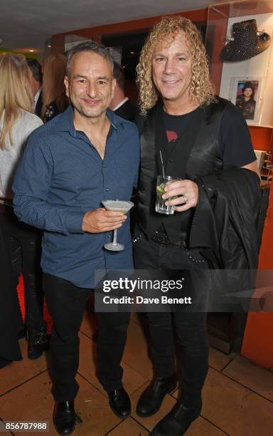 Playwright Joe DiPietro and composer David Bryan attend the press night after party for "The Toxic Avenger: The Musical" at The Planet Hollywood on...