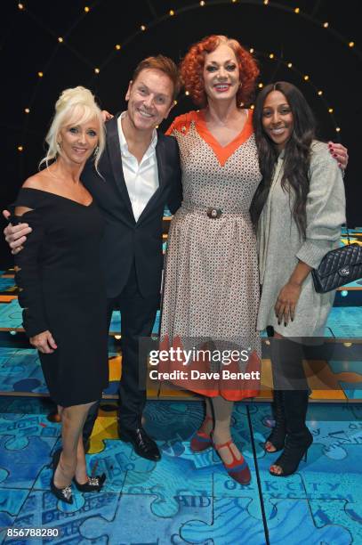 Debbie McGee, Brian Conley, cast member Craig Revel Horwood and Alexandra Burke pose backstage following the cast change press night performance of...