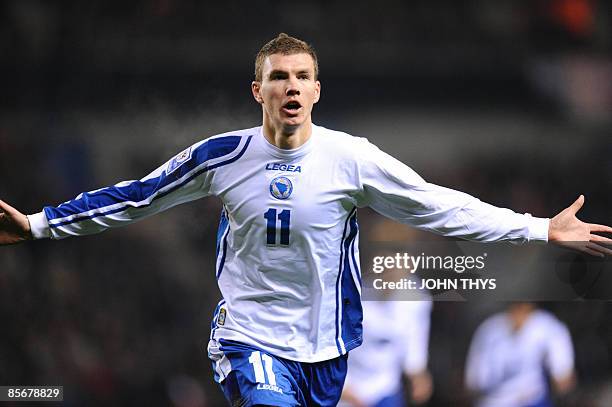 Bosnia Hercegovina's player Edin Dzeko celebrates his goal against Belgium during their World Cup 2010 qualifying match in Genk on March 28, 2009....