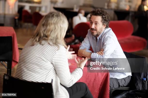 Guillaume Gallienne speaks with a reporter during 32nd Namur International French-Language Film on October 2, 2017 in Namur, Belgium.