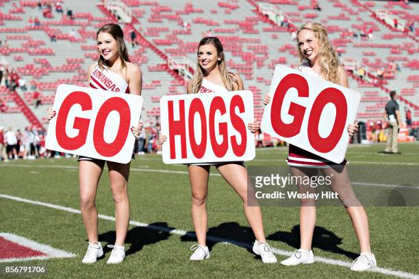 Cheerleaders of the Arkansas Razorbacks posing before a game against the New Mexico State Aggies at Donald W. Reynolds Razorback Stadium on September...