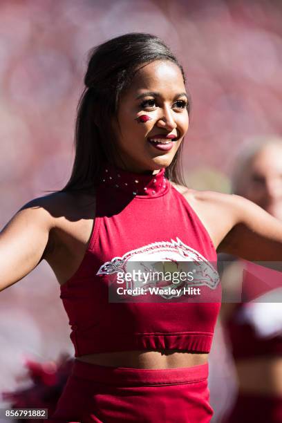 Cheerleader of the Arkansas Razorbacks perform during a game against the New Mexico State Aggies at Donald W. Reynolds Razorback Stadium on September...