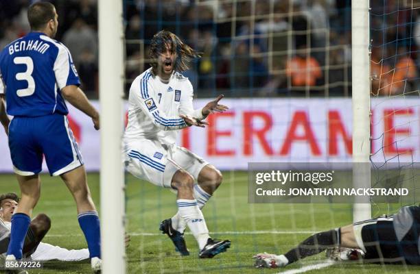 Greece's Georgios Samaras reacts after missing a shot during their 2010 World Cup European zone group 2 qualifying football match against Israel at...