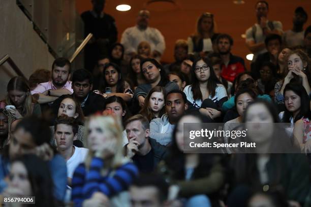 Dozens of New York University students attend a vigil for the victims of the mass shooting in Las Vegas on October 2, 2017 in New York City. At least...