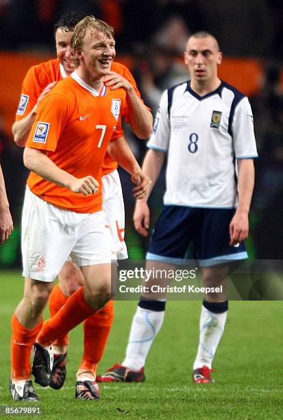 Dirk Kuyt of Netherlands celebrates the third goal with Mark van Boommel during the FIFA 2010 World Cup qualifying match between Netherlands and...