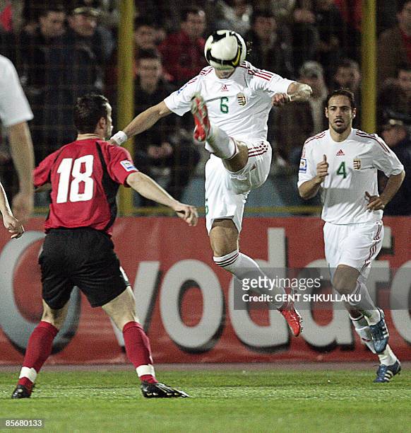 Albania's Hamdi Salihi fights for the ball with Hungary's Peter Halmosi during their World Cup 2010 qualification match at Qemal Stafa Stadium in...