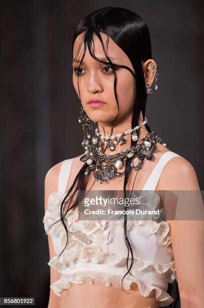 Model walks the runway during the Alexander McQueen Paris show as part of the Paris Fashion Week Womenswear Spring/Summer 2018 on October 2, 2017 in...