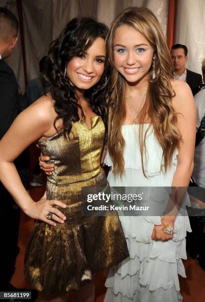 Actress Demi Lovato and singer/actress Miley Cyrus arrive at Nickelodeon's 2009 Kids' Choice Awards at UCLA's Pauley Pavilion on March 28, 2009 in...