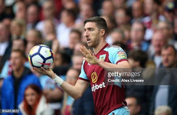 Stephen Ward of Burnley takes a throw in during the Premier League match between Everton and Burnley at Goodison Park on October 1, 2017 in...