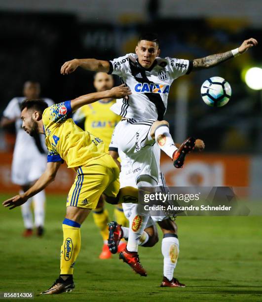 Everton Ribeiro of Flamengo and Danilo Barcelos of Ponte Preta in action during the match between Ponte Preta and Flamengo for the Brasileirao Series...