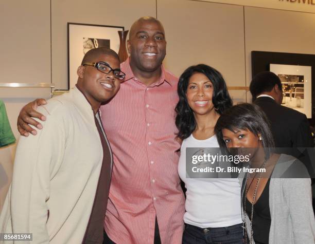 Hall of fame basketball legend, Earvin "Magic" Johnson poses with his son EJ, his wife, Cookie Johnson, and their daughter Elisa Johnson at the...
