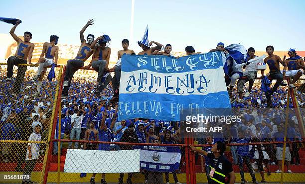 Salvadorean fans cheer their team during the FIFA World Cup South Africa 2010 qualifier match against the USA at the Cuscatlan stadium in San...
