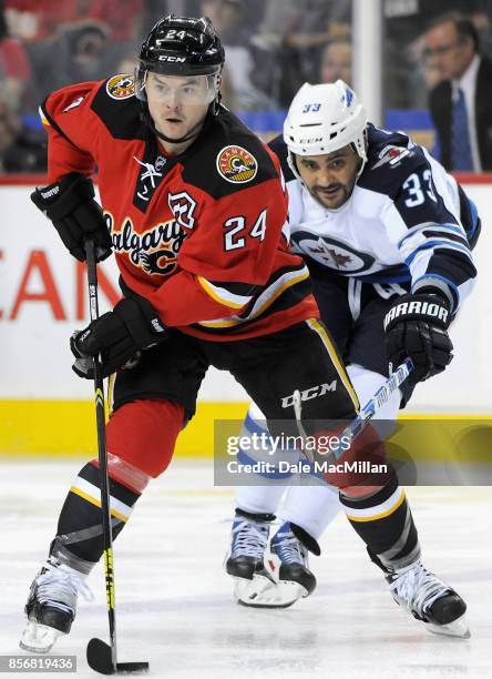 Jiri Hudler of the Calgary Flames plays in a game against the Winnipeg Jets at Scotiabank Saddledome on February 2, 2015 in Calgary, Alberta, Canada.