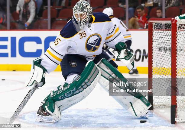 Goaltender Anders Lindback of the Buffalo Sabres warms up prior to a game against the New Jersey Devils at Prudential Center on February 17, 2015 in...