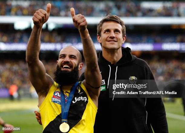 Bachar Houli of the Tigers celebrates with Ivan Maric of the Tigers during the 2017 Toyota AFL Grand Final match between the Adelaide Crows and the...