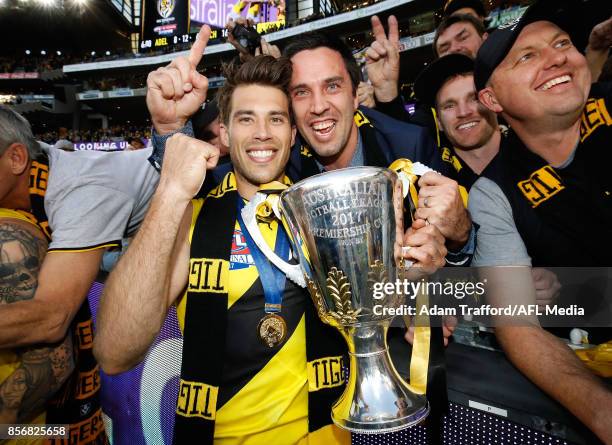 Alex Rance of the Tigers celebrates with former Tigers teammate Troy Chaplin during the 2017 Toyota AFL Grand Final match between the Adelaide Crows...