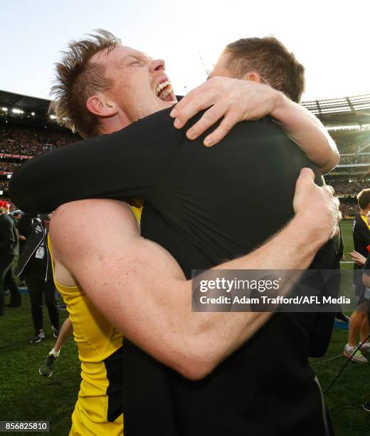 Jack Riewoldt of the Tigers celebrates with Tigers legend Matthew Richardson during the 2017 Toyota AFL Grand Final match between the Adelaide Crows...