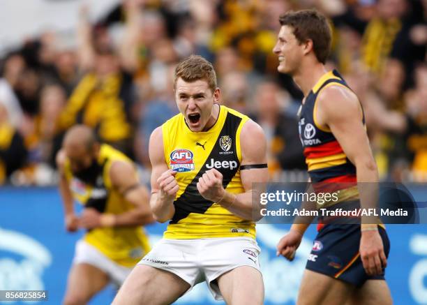 Jacob Townsend of the Tigers celebrates a goal during the 2017 Toyota AFL Grand Final match between the Adelaide Crows and the Richmond Tigers at the...