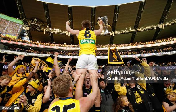 Jack Riewoldt of the Tigers celebrates with the cheer squad during the 2017 Toyota AFL Grand Final match between the Adelaide Crows and the Richmond...