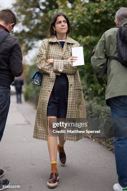 Leandra Medine is seen attending Sacai during Paris Fashion Week wearing Sacai on October 2, 2017 in Paris, France.