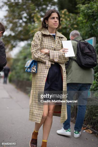 Leandra Medine is seen attending Sacai during Paris Fashion Week wearing Sacai on October 2, 2017 in Paris, France.