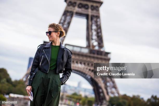 Vika Gazinskaya is seen in front of the Eiffel Tower before the Hermes show during Paris Fashion Week Womenswear SS18 on October 2, 2017 in Paris,...