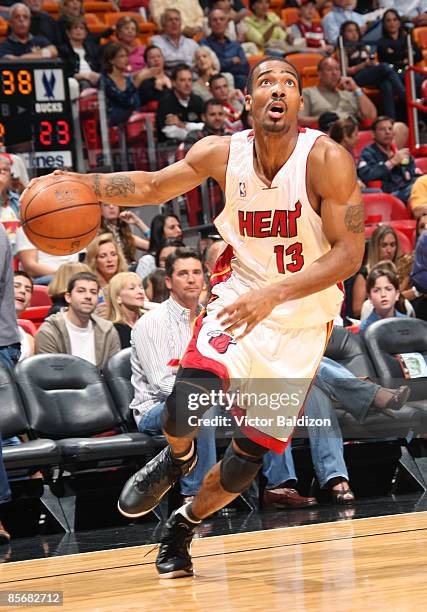 Luther Head of the Miami Heat drives against the Milwaukee Bucks on March 28, 2009 at the American Airlines Arena in Miami, Florida. NOTE TO USER:...