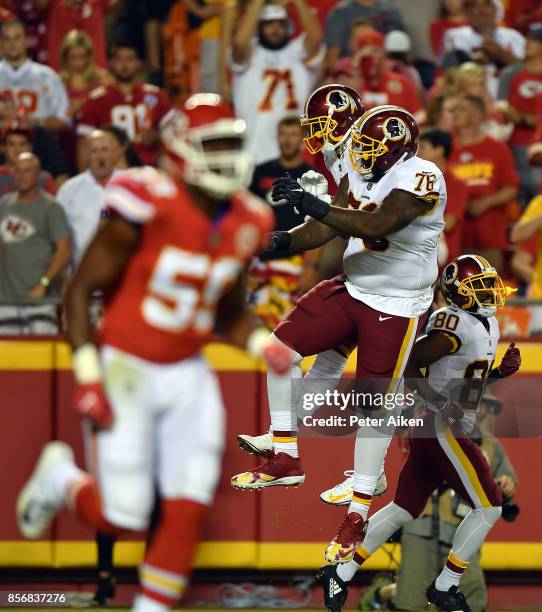 Wide receiver Terrelle Pryor and offensive tackle Morgan Moses of the Washington Redskins celebrate after a touchdown during the game against the...