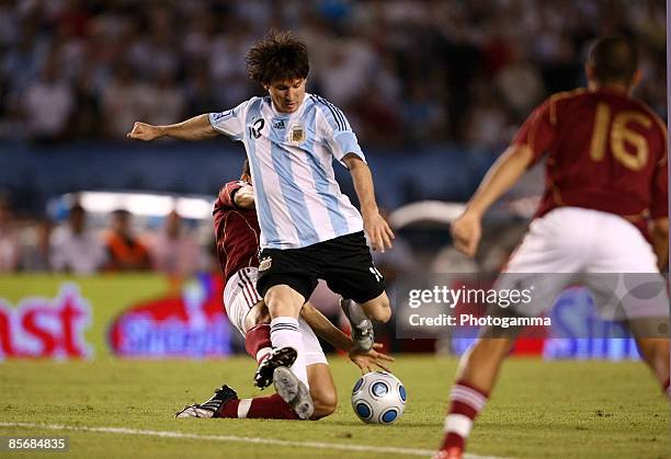 Lionel Messi of Argentina takes a shot during the 2010 FIFA World Cup South African qualifier match between Argentina and Venezuela at River Plate...