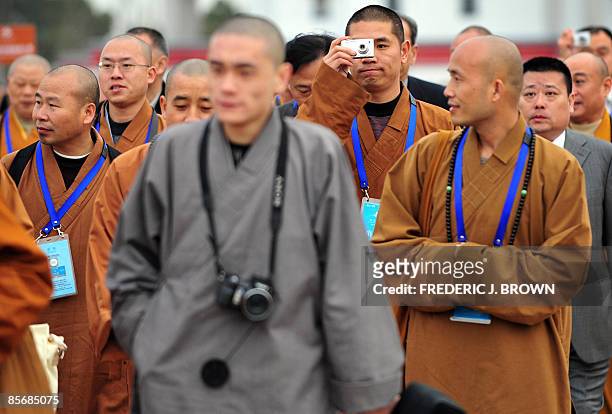 Buddhist monks arrive for the World Buddhist Forum on March 28, 2009 in Wuxi, in eastern China's Jiangsu province, where China's choice as the second...