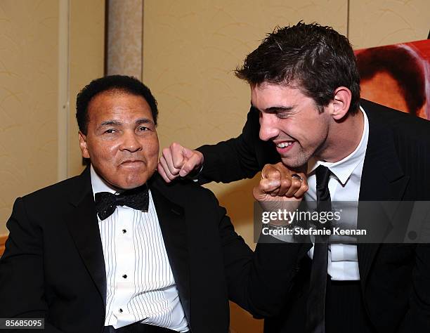 Muhammad Ali and Olympic swimmer Michael Phelps pose during Muhammad Ali's Celebrity Fight Night XV held at the JW Marriott Desert Ridge Resort & Spa...