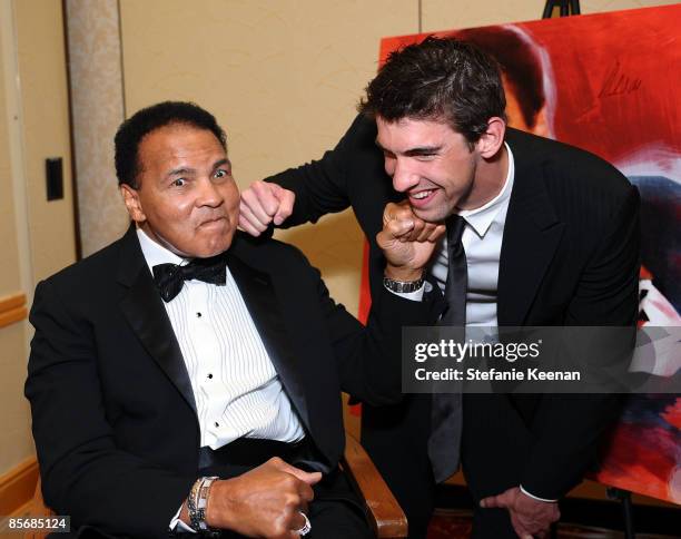 Muhammad Ali and Olympic swimmer Michael Phelps pose during Muhammad Ali's Celebrity Fight Night XV held at the JW Marriott Desert Ridge Resort & Spa...