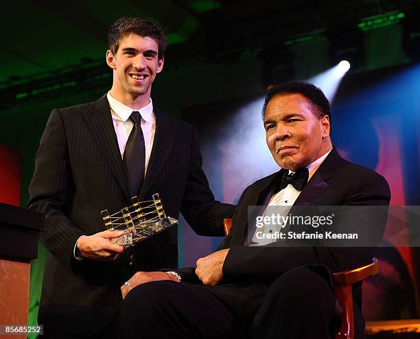 Michael Phelps and Muhammad Ali pose during Muhammad Ali's Celebrity Fight Night XV held at the JW Marriott Desert Ridge Resort & Spa on March 28,...