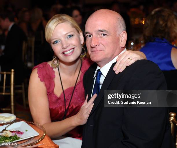 Actress Melissa Peterman and John Brady pose during Muhammad Ali's Celebrity Fight Night XV held at the JW Marriott Desert Ridge Resort & Spa on...