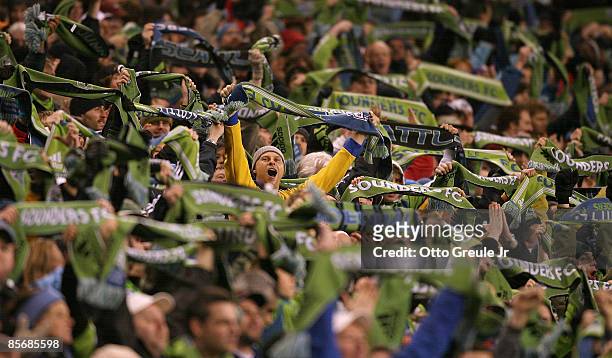 Seattle Sounders fans celebrate their second goal by forward Fredy Montero against Real Salt Lake on March 28, 2009 at Qwest Field in Seattle,...