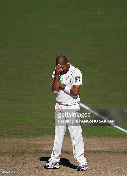 New Zealand cricketer Zeetan Patel reacts after he was hit for a boundary during the fourth day of the second Test match between New Zealand and...